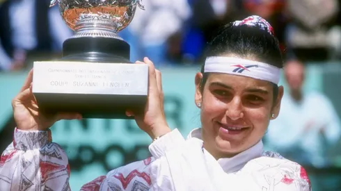 Arantxa Sanchez-Vicario of Spain holds up her trophy at the French Open at Roland Garros in France (1994)
