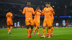 Brahim Diaz of Real Madrid celebrates scoring his team's second goal with Vinicius Junior during the UEFA Champions League 2024/25 League Knockout Play-off first leg match between Manchester City and Real Madrid C.F. at Manchester City Stadium on February 11, 2025 in Manchester, England.