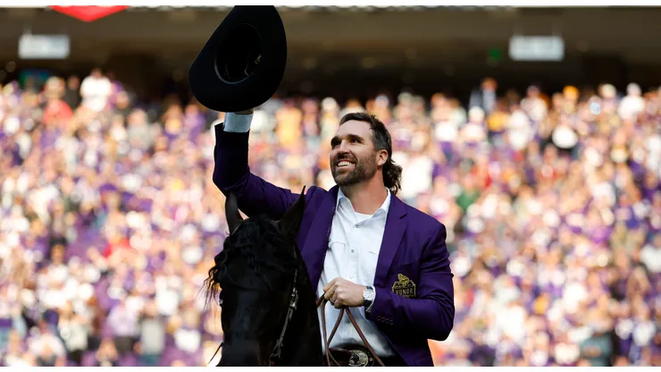 Jared Allen, former defensive end of the Minnesota Vikings, celebrates as he is inducted into the Vikings' Ring of Honor during halftime at U.S. Bank Stadium on October 30, 2022 in Minneapolis, Minnesota.
