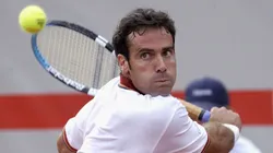 Alex Corretja of Spain plays a backhand during the quarter-final against Albert Costa of Spain during the Open Seat Godo.