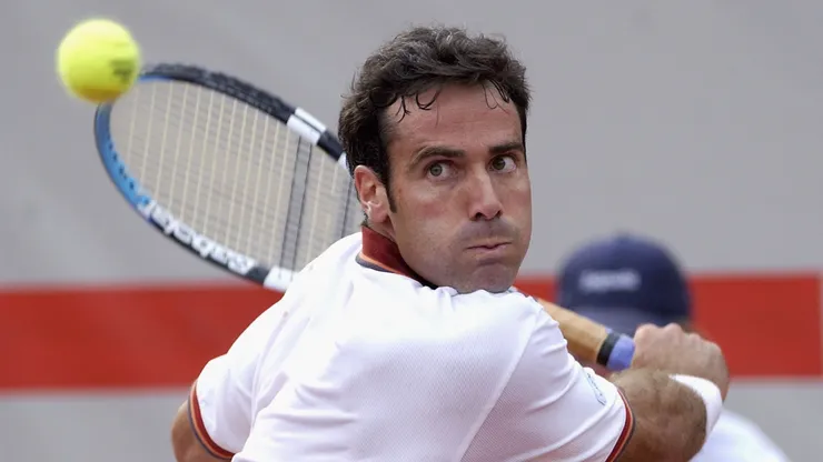Alex Corretja of Spain plays a backhand during the quarter-final against Albert Costa of Spain during the Open Seat Godo.