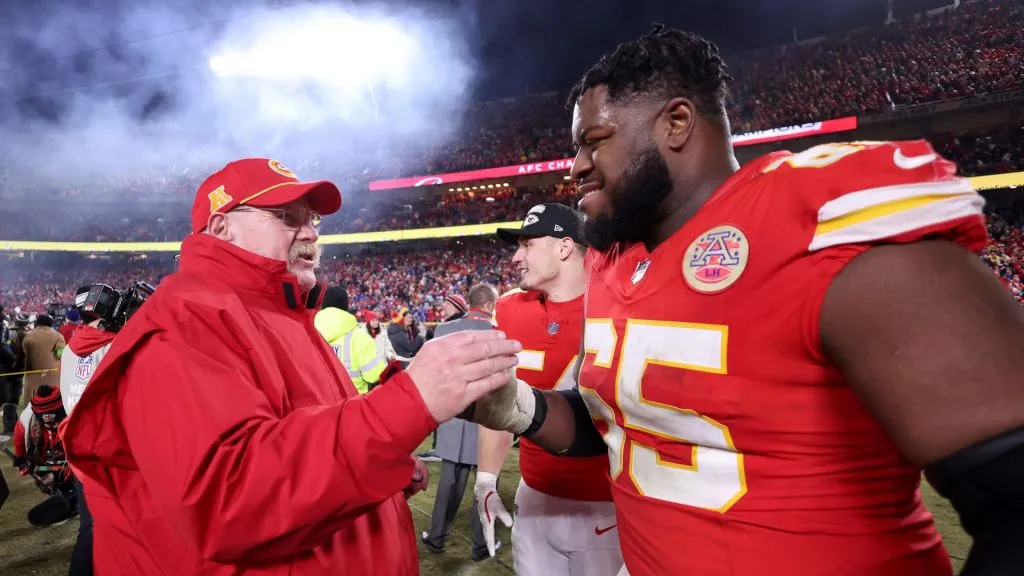 Andy Reid of the Kansas City Chiefs shakes hands with Trey Smith #65 after defeating the Buffalo Bills 32-29 in the AFC Championship Game at GEHA Field at Arrowhead Stadium on January 26, 2025 in Kansas City, Missouri.