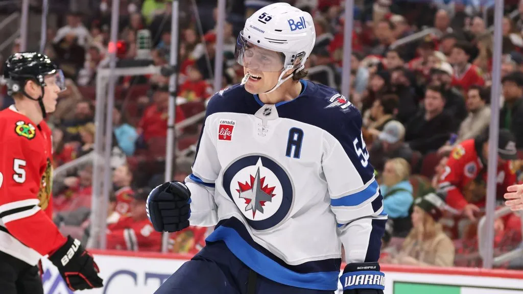 Mark Scheifele #55 of the Winnipeg Jets celebrates after scoring a goal against the Chicago Blackhawks during the third period at the United Center on December 07, 2024. (Source: Michael Reaves/Getty Images)