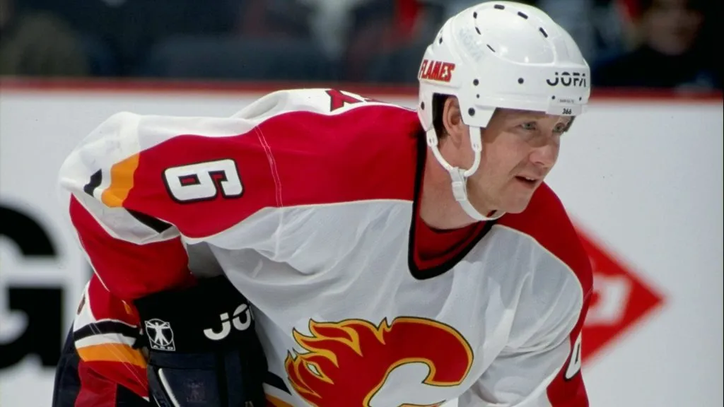 Phil Housley #6 of the Calgary Flames waits for the puck during the game against the Philadelphia Flyers in 1998. (Source: Ian Tomlinson /Allsport)