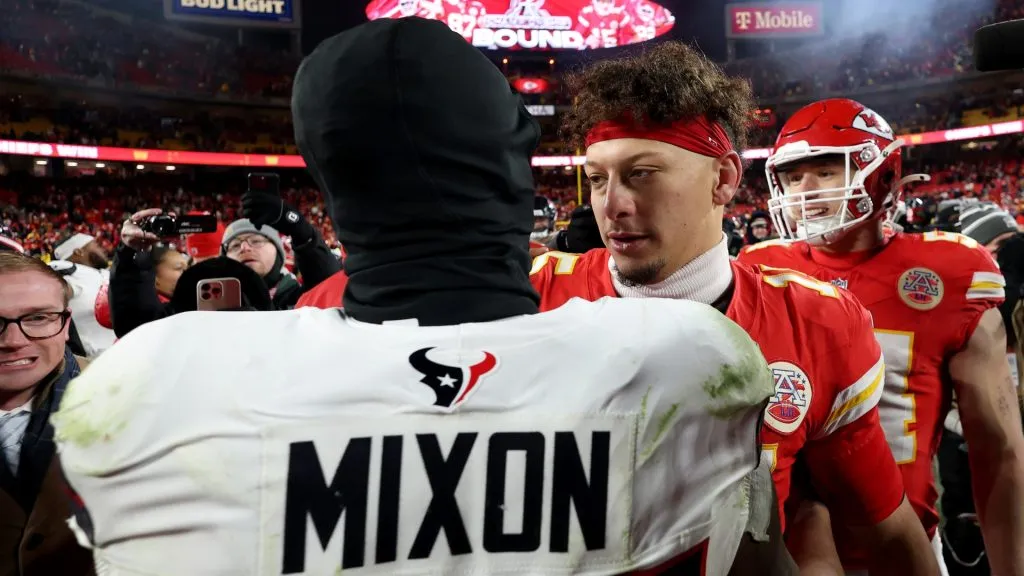 Patrick Mahomes (R) #15 of the Kansas City Chiefs talks with Joe Mixon (L) #28 of the Houston Texans after the AFC Divisional Playoff at GEHA Field at Arrowhead Stadium on January 18, 2025 in Kansas City, Missouri.