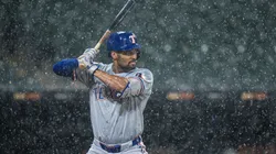 Marcus Semien #2 of the Texas Rangers bats during a rain storm against the Chicago White Sox at Guaranteed Rate Field on August 27, 2024.