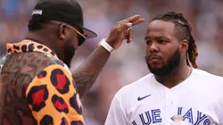 Vladimir Guerrero Jr. #27 of the Toronto Blue Jays speaks with David Ortiz during the T-Mobile Home Run Derby at T-Mobile Park on July 10, 2023 in Seattle, Washington.
