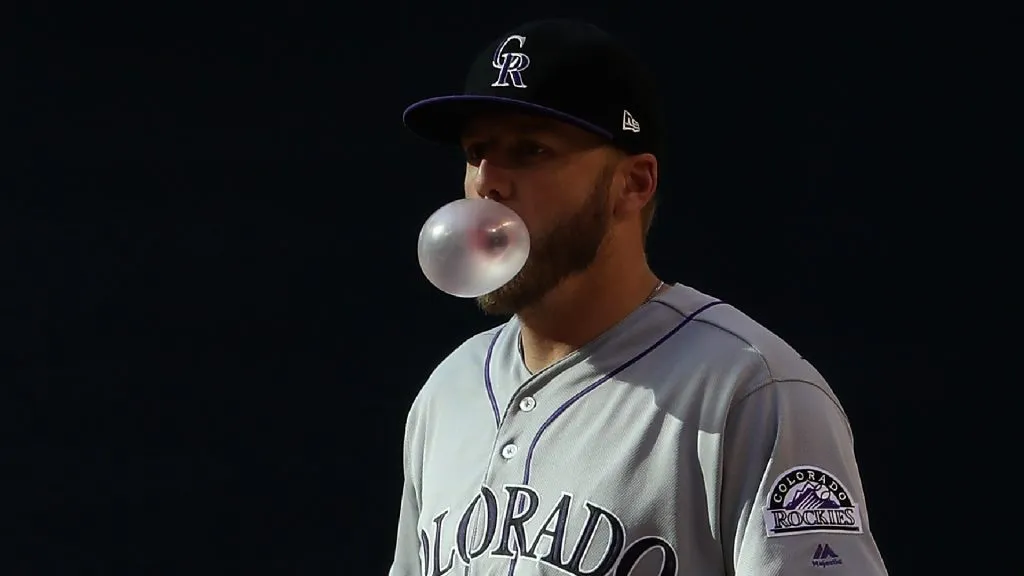 Infielder Mark Reynolds #12 of the Colorado Rockies blows a bubble with gum during the MLB game against the Arizona Diamondbacks at Chase Field on April 30, 2017. (Source: Christian Petersen/Getty Images)