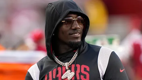 Deebo Samuel #19 of the San Francisco 49ers looks on from the sideline during the third quarter of an NFL preseason game against the Green Bay Packers at Levi's Stadium on August 12, 2022 in Santa Clara, California.