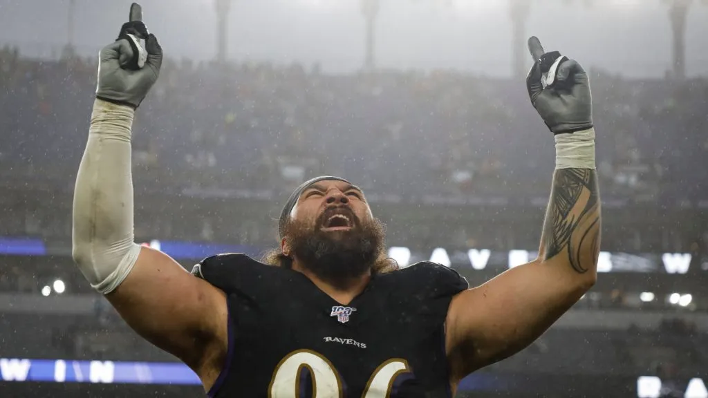 Domata Peko #96 of the Baltimore Ravens celebrates after the game against the San Francisco 49ers at M&amp;T Bank Stadium on December 1, 2019 in Baltimore, Maryland.