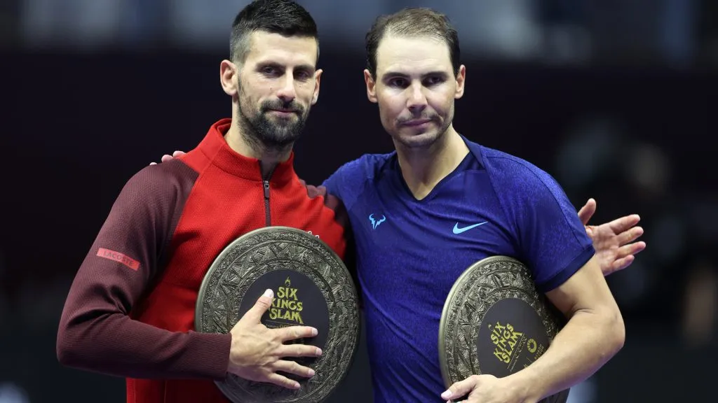 Novak Djokovic poses for a photo with Rafael Nadal after defeating him to win the Third Place Playoff match of the Six Kings Slam 2024. (Richard Pelham/Getty Images)