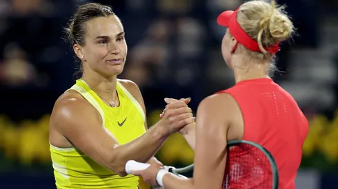 Aryna Sabalenka shakes hands after being defeated by Clara Tauson of Denmark in their third round match during day four of the Dubai Duty Free Tennis Championships in 2025.