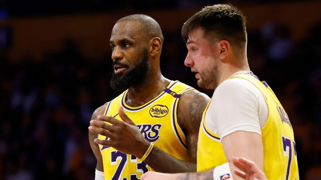 LeBron James and Luka Doncic of the Los Angeles Lakers talk during a game against the Utah Jazz on February 10, 2025.