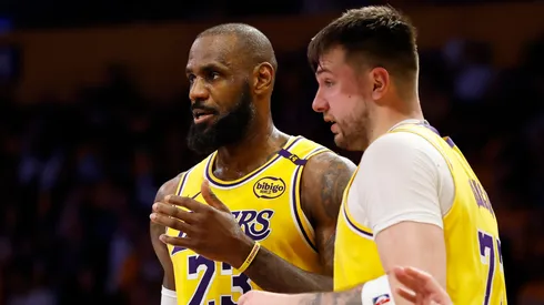 LeBron James and Luka Doncic of the Los Angeles Lakers talk during a game against the Utah Jazz on February 10, 2025.