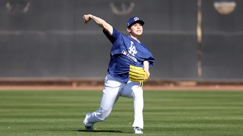 Roki Sasaki #11 of the Los Angeles Dodgers throw during workouts at Camelback Ranch on February 11, 2025 in Glendale, Arizona.