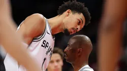 Spurs' Victor Wembanyama listens to Chris Paul during a game against the Atlanta Hawks on February 05, 2025.