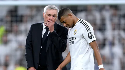 Carlo Ancelotti speaks to Kylian Mbappe at the end of the LaLiga match between Real Madrid CF and RCD Espanyol on September 21, 2024.
