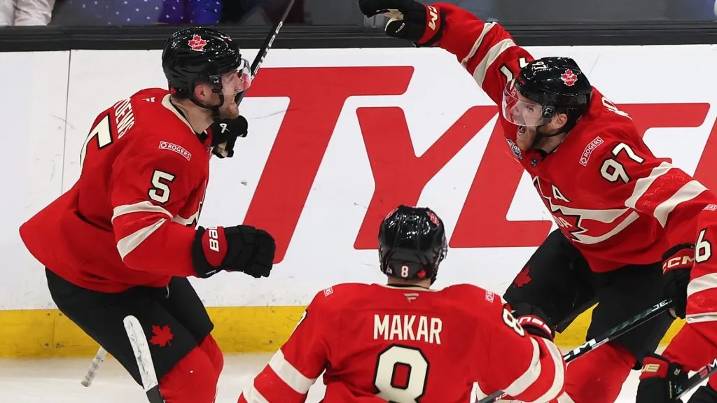 Connor McDavid #97 of Team Canada celebrates after scoring the game winning goal against Connor Hellebuyck #37 of Team United States in overtime to win the NHL 4 Nations Face-Off Championship Game at TD Garden on February 20, 2025 in Boston, Massachusetts.