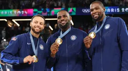 Stephen Curry, LeBron James, and Kevin Durant of Team United States pose for a photo during the Men's basketball medal ceremony on day fifteen of the Olympic Games Paris 2024 at Bercy Arena on August 10, 2024 in Paris, France.