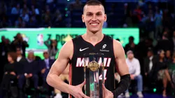 Tyler Herro of the Miami Heat poses with the trophy after winning the 3-Point Contest as part of the 2025 All-Star Weekend.