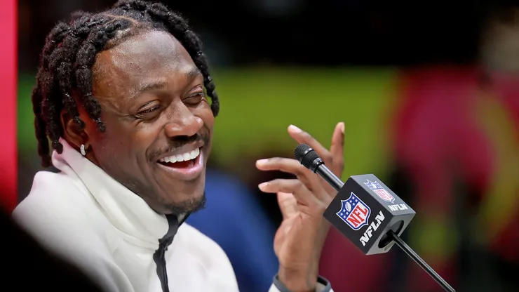 Philadelphia Eagles wide receiver A.J. Brown answers questions on the field inside the Caesars Superdome during the Super Bowl Opening Night on February 3, 2025 in New Orleans, Louisiana. The Philadelphia Eagles and Kansas City Chiefs were made available for interviews during an energetic, New Orleans-themed event ahead of next Sunday's Super Bowl LIX.