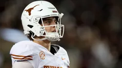 Arch Manning #16 of the Texas Longhorns warms up before the game against the Texas A&M Aggies at Kyle Field on November 30, 2024 in College Station, Texas.