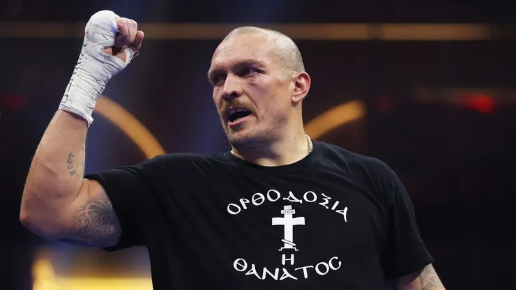 Oleksandr Usyk celebrates victory following the IBF, IBO, WBA, WBC and WBO Undisputed World Heavyweight titles' fight between Oleksandr Usyk and Tyson Fury as part of Oleksandr Usyk v Tyson Fury 2, Reignited card at Kingdom Arena on December 21, 2024 in Riyadh, Saudi Arabia.