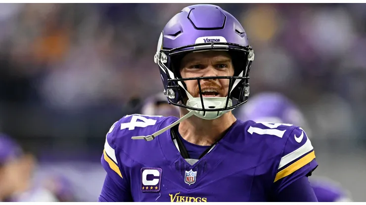 Sam Darnold #14 of the Minnesota Vikings celebrates after throwing a touchdown pass against the Atlanta Falcons during the second quarter at U.S. Bank Stadium on December 08, 2024 in Minneapolis, Minnesota.