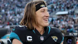 Trevor Lawrence #16 of the Jacksonville Jaguars smiles on the field after defeating the Dallas Cowboys at TIAA Bank Field on December 18, 2022 in Jacksonville, Florida.