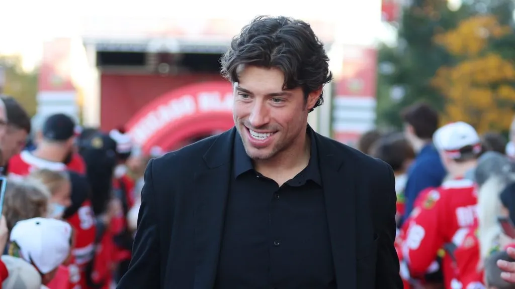 Craig Smith #15 of the Chicago Blackhawks arrives to the red carpet prior to the Chicago Blackhawks home opener against the San Jose Sharks at the United Center on October 17, 2024 in Chicago, Illinois.