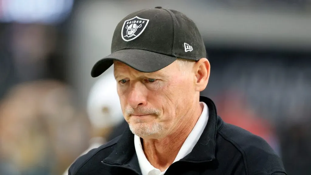 General manager Mike Mayock of the Las Vegas Raiders walks on the field before a game against the Philadelphia Eagles at Allegiant Stadium on October 24, 2021 in Las Vegas, Nevada.