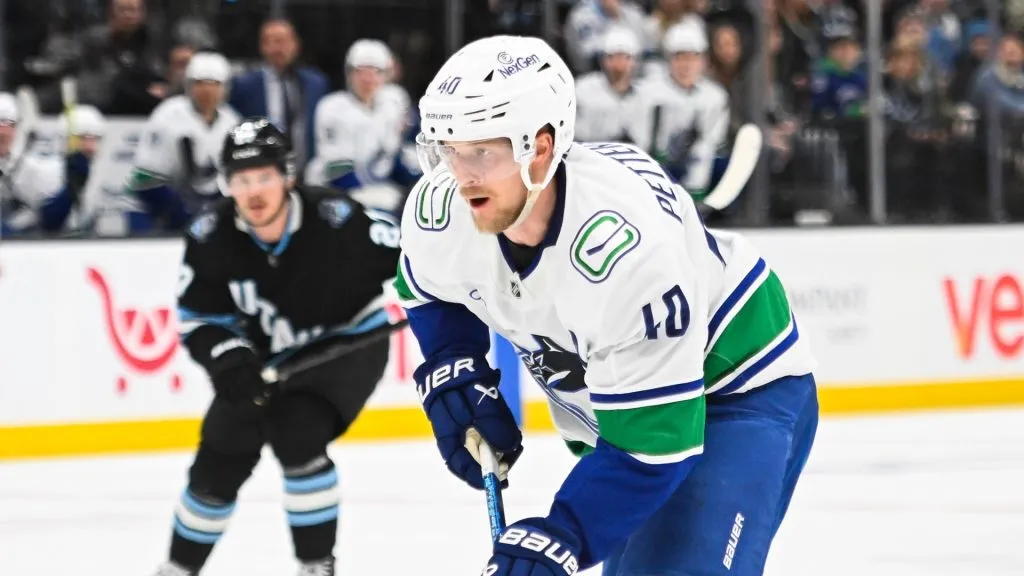 Elias Pettersson #40 of the Vancouver Canucks skates the puck during the third period of a game against the Utah Hockey Club at Delta Center on February 23, 2025 in Salt Lake City, Utah.