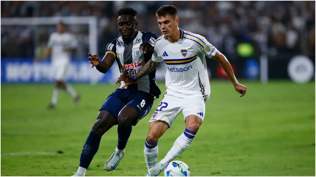 Kevin Zenon of Boca Juniors competes for the ball against Eryc Castillo of Alianza Lima – Fernando Sangama/Getty Images