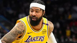 Markieff Morris #88 of the Los Angeles Lakers drives into Cody Williams #5 of the Utah Jazz during the second half of a game at Delta Center on February 12, 2025 in Salt Lake City, Utah.