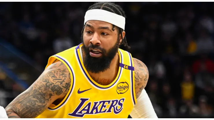 Markieff Morris #88 of the Los Angeles Lakers drives into Cody Williams #5 of the Utah Jazz during the second half of a game at Delta Center on February 12, 2025 in Salt Lake City, Utah.