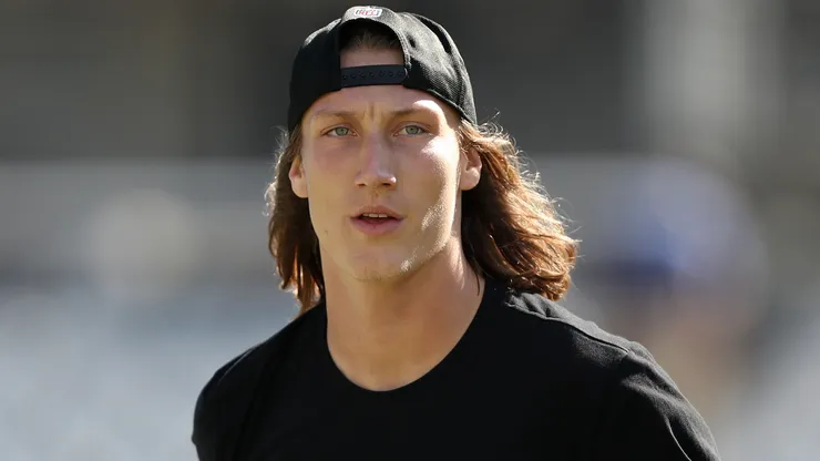 Trevor Lawrence #16 of the Jacksonville Jaguars takes to the field during warm ups against the New York Giants at TIAA Bank Field on October 23, 2022 in Jacksonville, Florida.
