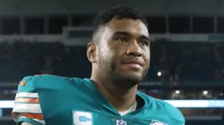 Tua Tagovailoa #1 of the Miami Dolphins walks off the field with the game ball after defeating the Pittsburgh Steelers 16-10 at Hard Rock Stadium on October 23, 2022 in Miami Gardens, Florida.