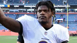 Lamar Jackson #8 of the Baltimore Ravens acknowledges Ravens fans in the seats as he walks off the field after their 23-7 win against the Denver Broncos at Empower Field At Mile High on October 03, 2021 in Denver, Colorado.
