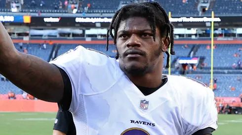 Lamar Jackson #8 of the Baltimore Ravens acknowledges Ravens fans in the seats as he walks off the field after their 23-7 win against the Denver Broncos at Empower Field At Mile High on October 03, 2021 in Denver, Colorado.