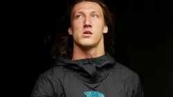 Trevor Lawrence #16 of the Jacksonville Jaguars walks to the field prior to the game against the Houston Texans at NRG Stadium on September 12, 2021 in Houston, Texas.