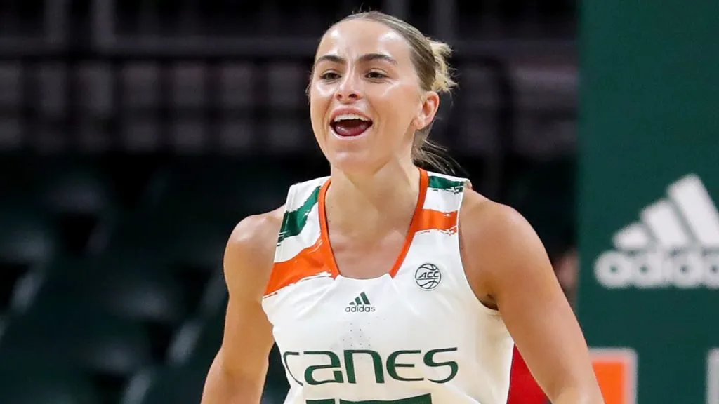 Hanna Cavinder #15 of the Miami Hurricanes reacts after making a basket against the Florida Atlantic Owls during the first quarter of the game at Watsco Center on November 16, 2022 in Coral Gables, Florida.