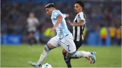 Maximiliano Salas of Racing Club controls the ball against Vitinho of Botafogo