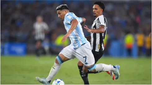 Maximiliano Salas of Racing Club controls the ball against Vitinho of Botafogo