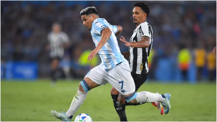 Maximiliano Salas of Racing Club controls the ball against Vitinho of Botafogo