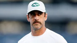 Aaron Rodgers #8 of the New York Jets looks on during warmups before the first half of a preseason game against the Tampa Bay Buccaneers at MetLife Stadium on August 19, 2023 in East Rutherford, New Jersey.