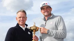 Keegan Bradley of Team USA and Luke Donald of Team Europe with the Ryder Cup trophy.