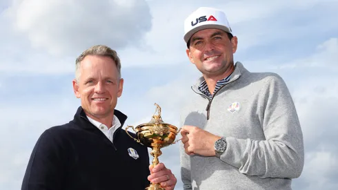 Keegan Bradley of Team USA and Luke Donald of Team Europe with the Ryder Cup trophy.