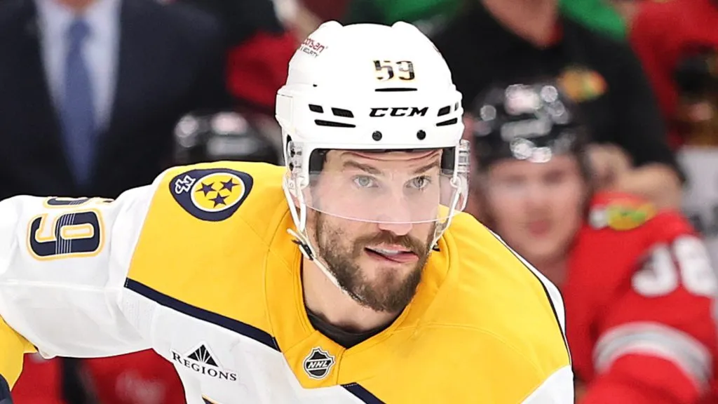 Roman Josi #59 of the Nashville Predators skates with the puck against the Chicago Blackhawks during the third period at the United Center on February 07, 2025 in Chicago, Illinois.