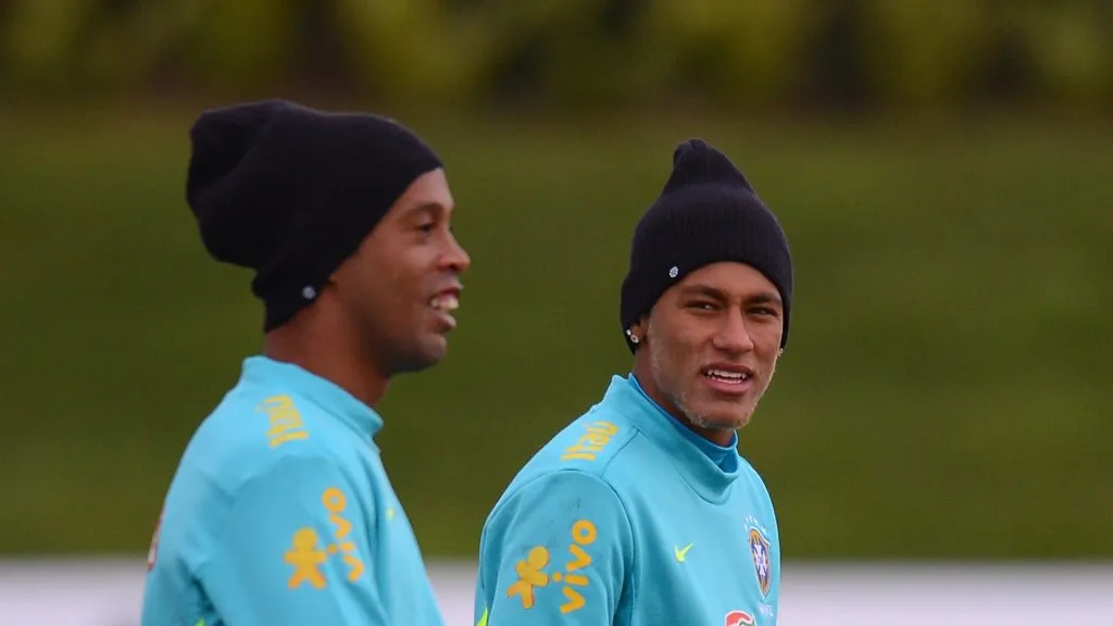 Neymar (R) and Ronaldinho of Brazil in action during a Brazil training session