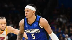 Paolo Banchero #5 of the Orlando Magic drives to the basket against Kevin Knox II #31 of the Golden State Warriors